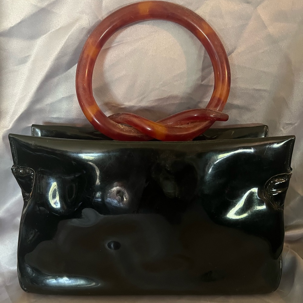 Vintage 1950’s Patent Leather handbag with ornate Bakelite handle